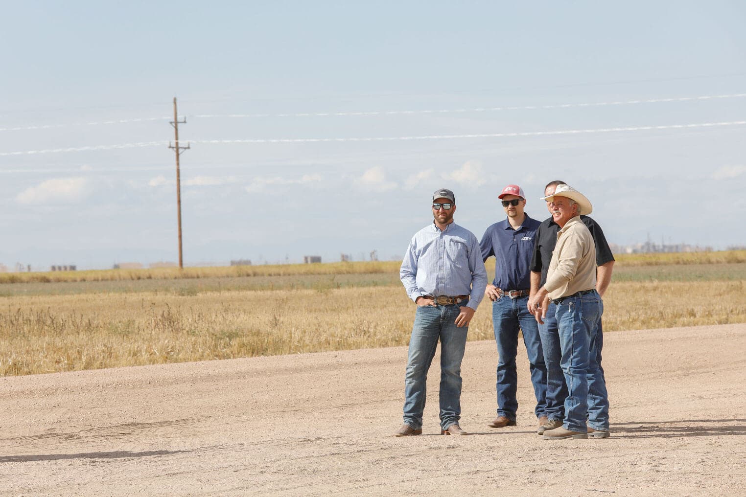 men standing around talking